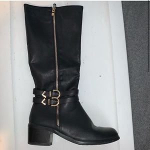 Black riding boots with heel! Got them in Spain!